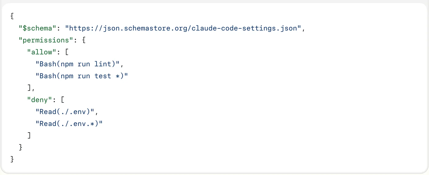 Exemple officiel de réglages Claude Code avec une liste deny qui bloque la lecture des fichiers .env